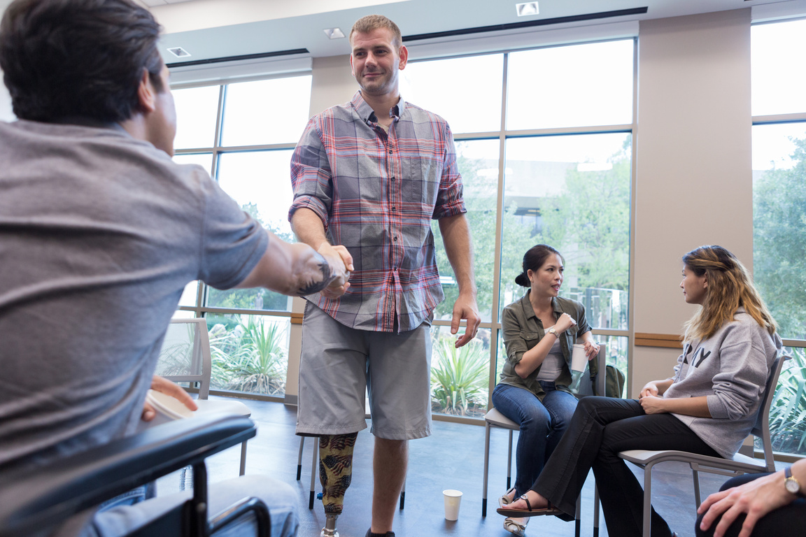 Wounded veteran greets fellow veteran